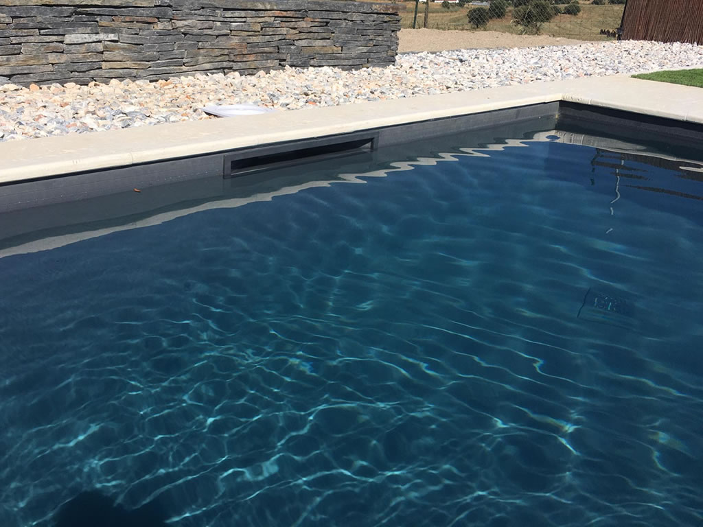 Charcoal grey Tesela is one of the most popular reinforced membranes that Cefil Pool install in swimming pools